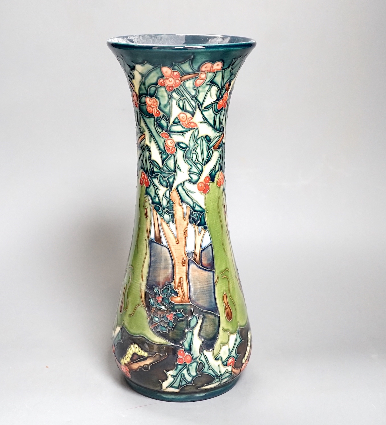 A Moorcroft vase with woodland scene - 30cm high